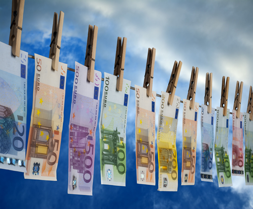Counterfeit money drying outside on a clothes line